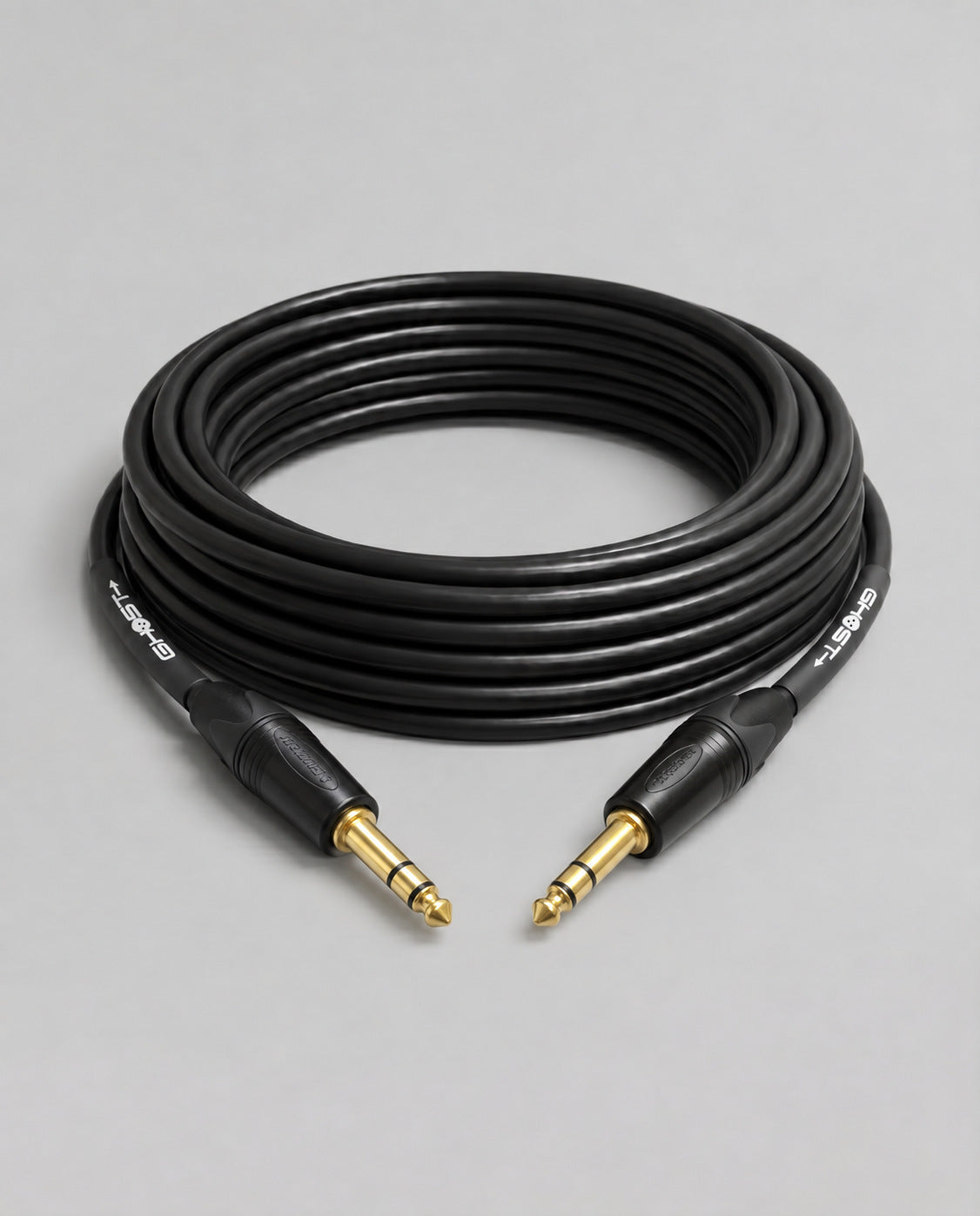Ghost analog cable, 1/4 inch TRS to TRS, black jacket, coiled